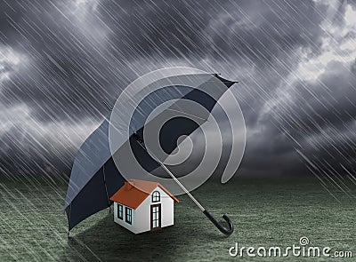 Umbrella covering home under heavy rain Stock Photo