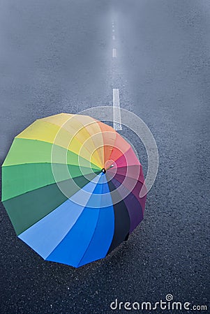 Umbrella on the road Stock Photo