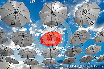 Umbrella standing out from the crowd unique concept mental health depression Stock Photo