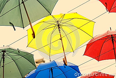 Umbrellas in the air, bright spots Stock Photo