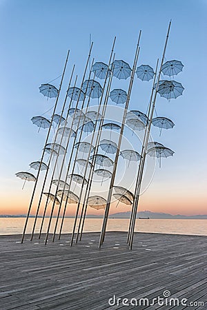 The Umbrellas installation at the New Waterfront of Thessaloniki during sunrise in Greece. Editorial Stock Photo
