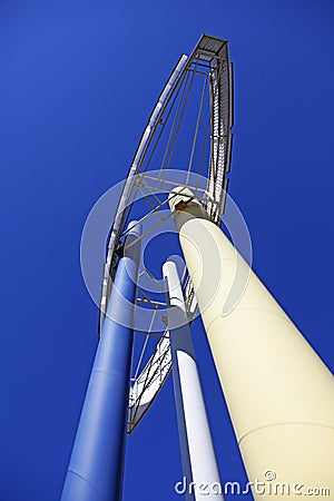 three tall pillars to a huge billboard Editorial Stock Photo