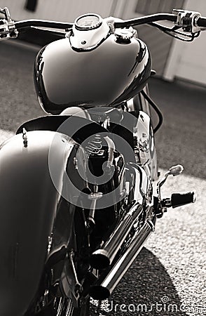 A classic motorcycle seen from behind with polished metal surfaces Editorial Stock Photo