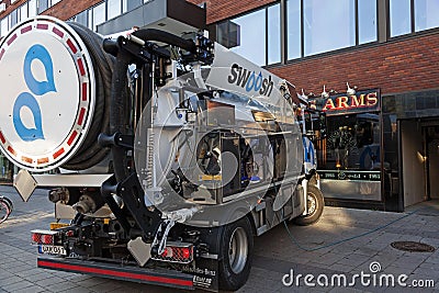 Sludge car has parked at the pub for sewer cleaning Editorial Stock Photo