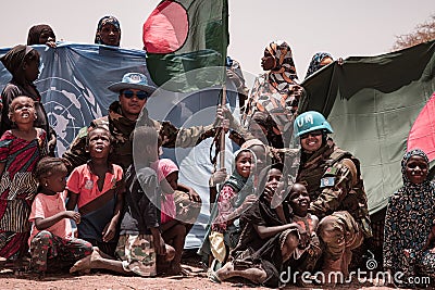 UN Peacekeepers with the UN and Bangladeshi flags Editorial Stock Photo