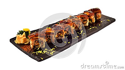 Unagi roll. Japanese eel sushi roll set on wooden ceramic plate.Traditional dinning of Japanese cui Stock Photo