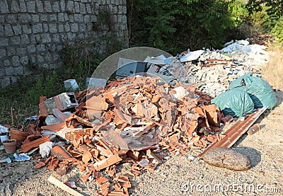 unauthorized storage of bricks and rubbles Stock Photo