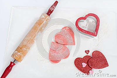 Unbaked Pink Cookie Dough Hearts with Accessories Stock Photo