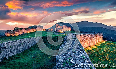 Unbelievabl sunset on ruins of Rozafa Castle. Spectacular evening scene of Shkoder city. Stock Photo