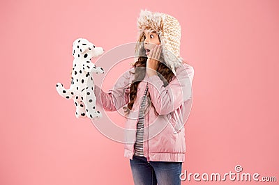 Unbelievable. Happy kid wondering communicate dog. Charity and donation concept. Happy small smiling child play with Stock Photo