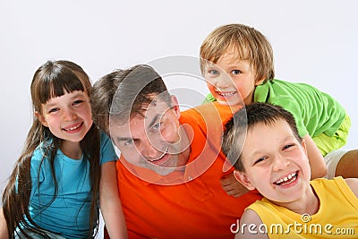 Uncle with nephews and niece Stock Photo