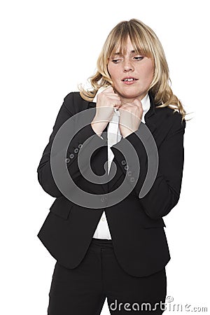Uncomfortable woman tugging at her collar Stock Photo
