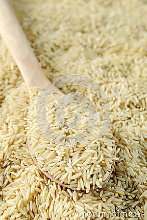 Uncooked Brown rice grains Stock Photo