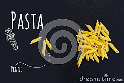 Uncooked Italian pasta Penne on black slate stone background Stock Photo