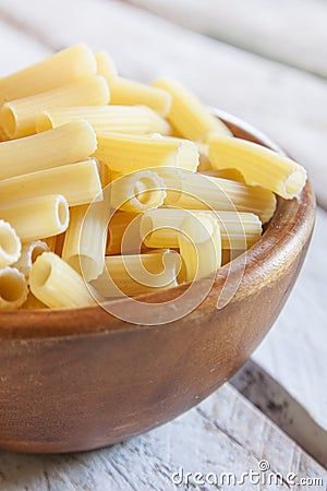 Uncooked macaroni bowl Stock Photo