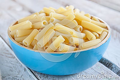 Uncooked macaroni bowl Stock Photo