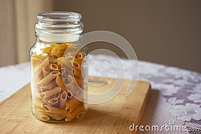 Uncooked penne pasta Stock Photo