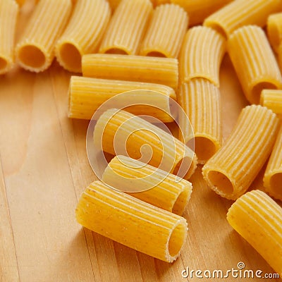 Uncooked penne rigate Stock Photo