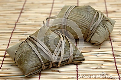 Uncooked rice dumplings Stock Photo