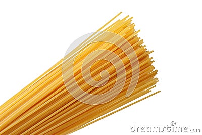 Uncooked yellow wheat spaghetti noodles on white background Stock Photo