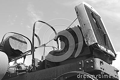 Uncovered shaft of a power takeoff of a tractor and a machine. Stock Photo