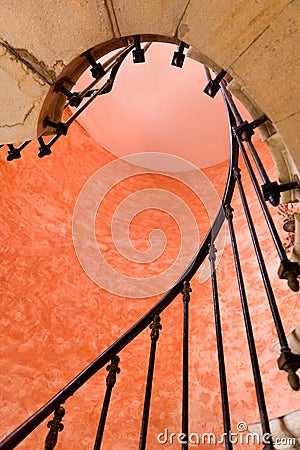 Under antique spiral staircase Stock Photo