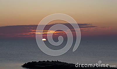 Beautiful sunrise on the northern beach of the resort of Pomorie. Black Sea, Bulgaria. Stock Photo