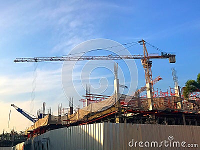 Under construction building covered with net and galvanized she Editorial Stock Photo
