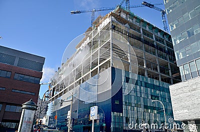 Under construction new Montreal`s Centre hospitalier de l`Universite de Montreal CHUM, Editorial Stock Photo