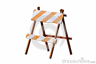 Under construction road block: orange white painted vintage wooden road block or barrier as wood frame barricade isolated Stock Photo