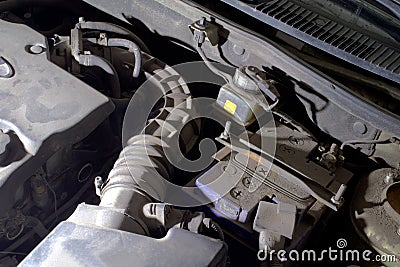 Under the hood of car. vehicle components, lighted by spotlight Stock Photo