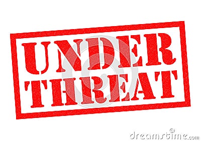 UNDER THREAT Stock Photo