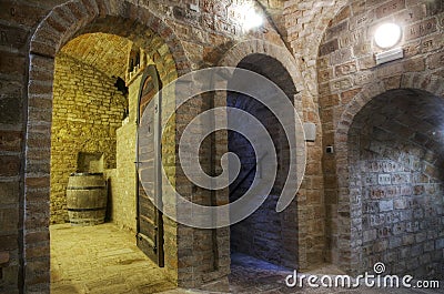 Underground corridors in wine cellar Stock Photo