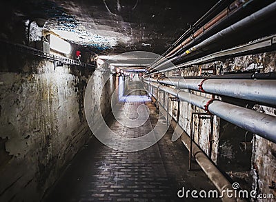 Underground maintenance tunnel corridor hallway passage Stock Photo