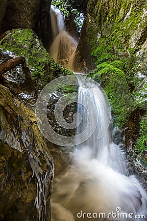 Underground river and waterfall in Romania Stock Photo