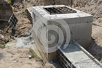 Underground septic tank and drain construction for water draining Stock Photo