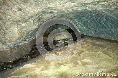 Underground stream. Small spillway in the cave Stock Photo