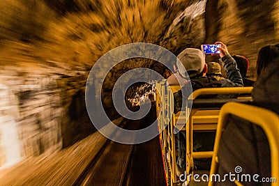 Underground tourist train in Postojna cave, Sloven Editorial Stock Photo