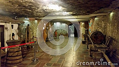 Underground wine cellar with collection of bottles, Cricova, Moldova Editorial Stock Photo