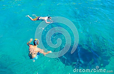 Undersea caves and unidentified divers, Mugla, Turkey Editorial Stock Photo