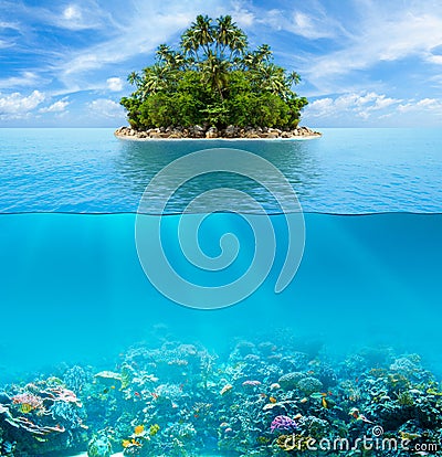 Underwater coral reef seabed and surface with tropical island Stock Photo