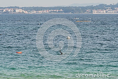 underwater fisherman diving in spanish beach in spain Stock Photo