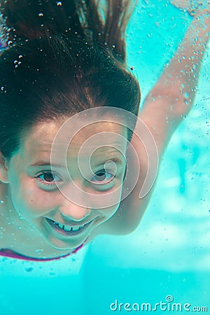 Underwater girl in the pool Stock Photo
