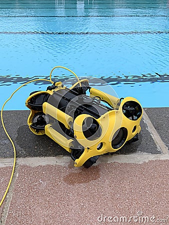 Underwater ROV camera drone next to swimming pool Stock Photo