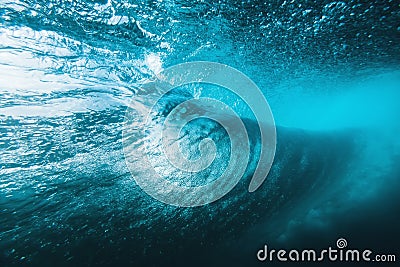 Underwater surfing wave in tropical ocean Stock Photo