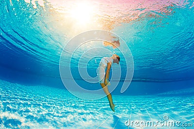 Underwater swimming and reflection in water Stock Photo