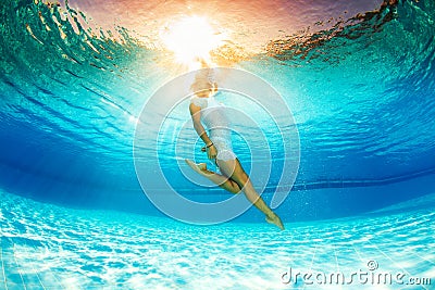 Underwater swimming and reflection in water Stock Photo