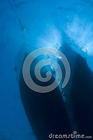 Underwater view of boat silhouettes. Stock Photo