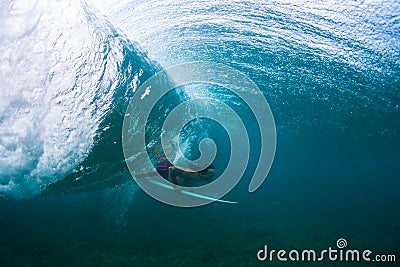 Underwater view of the young male surfer Stock Photo