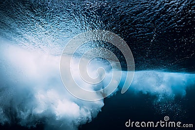 Underwater wave with foam. Blue powerful wave in sea Stock Photo